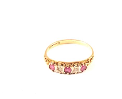 A 9ct gold ruby and diamond ring, size N