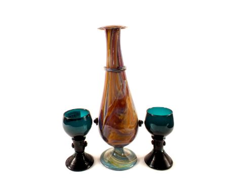 A pair of 19th Century green hock glasses and a Lithyalin type glass flask