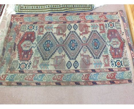 A Persian geometric rug, 74" x 40"