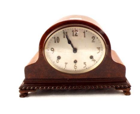 An oak cased German movement mantel clock