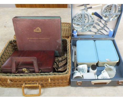 Cased fishing rods and reels, two picnic cases and contents, a box of pianola rolls plus a skin rug