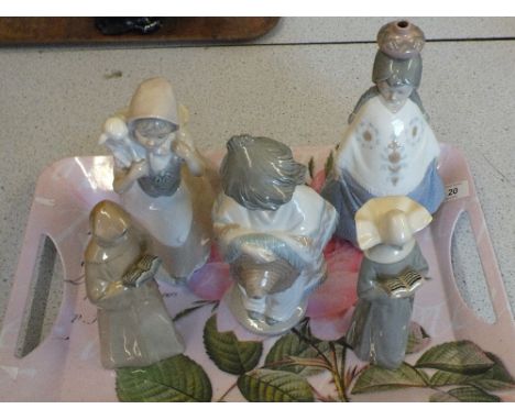 Four Nao plus one other Spanish figurine