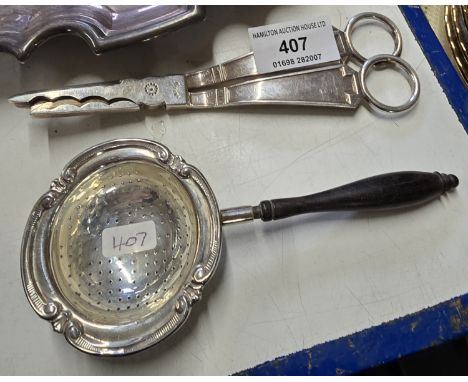 PAIR OF LONDON SILVER GRAPE SCISSORS, BIRMINGHAM SILVER TEA STRAINER WITH MAHOGANY HANDLE, WEIGHT APPROX 141.9 GRAMS INCLUDIN