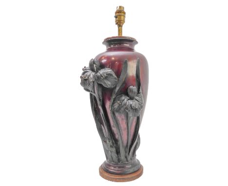 A late 19th / early 20th century elongated baluster-shaped Art Nouveau-style vase (possibly bronze): decorated in high relief