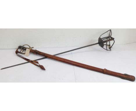 A Royal Artillery regulation pattern officer's sword with leather scabbard and an earlier sword with curved blade and basket 