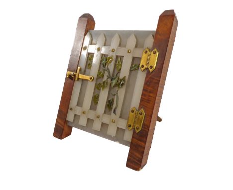 A 19th century satinwood cased white and green hardstone and gilt metal-mounted photograph frame modelled as a five-bar gate,