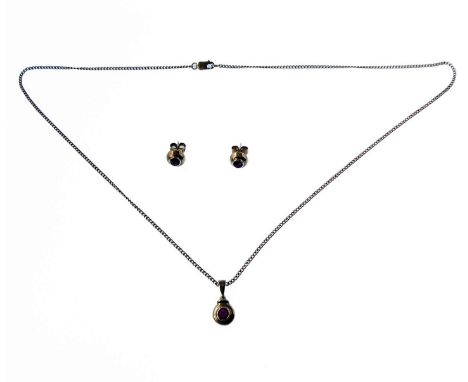 A 9-carat yellow gold earring, pendant and necklace set (boxed), each centred with a hand-cut faceted light-red/pink stone wi