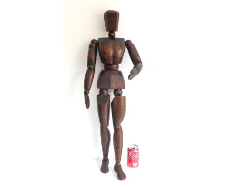 A very large stained wood artist's Lay figure (probably late 19th/early 20th century): with jointed arms, legs, waist and hea