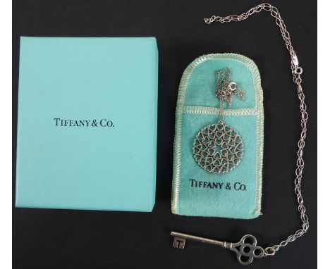 Tiffany &amp; Co. a hallmarked silver fully signed pendant modelled as a key upon a silver neck chain (boxed and also marked 