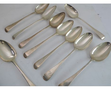 Nine matched early 19th century hallmarked silver serving spoons (all London assay marks with different makers and year lette