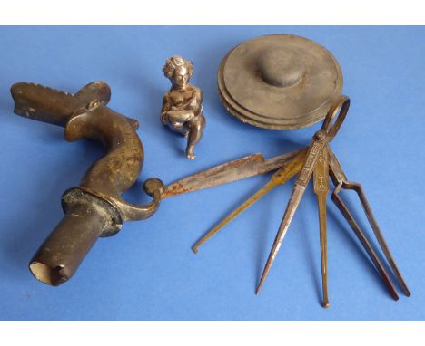 An interesting patinated bronze spout modelled as a mythical animal (17cm highest, 18th/19thcentury), together with a seated 