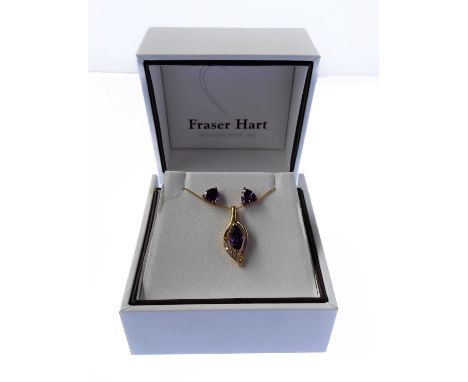 A 9-carat yellow gold pendant and earrings, each set with a hand-cut amethyst-style stone, the pendant with elliptical centra