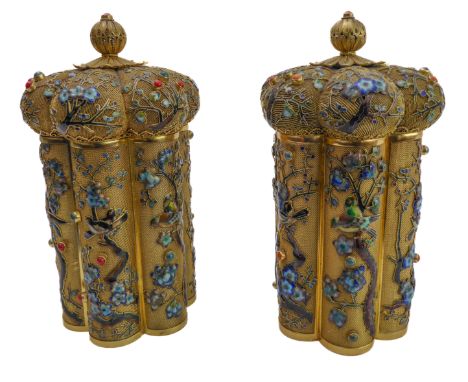 A very fine and unusual pair of 20th century Chinese silver-gilt jars and covers: lobed hexagonal form with cylindrical inter