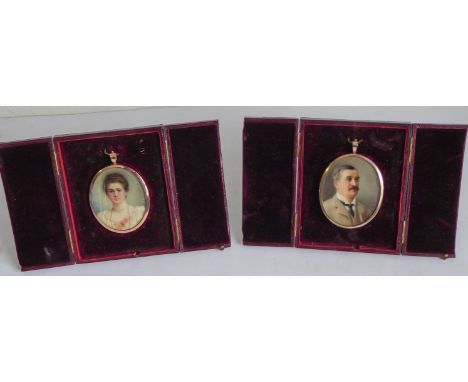 A pair of early 20th century&nbsp;silver-gilt-cased male and female shoulder-length portrait studies on card: the gentleman w