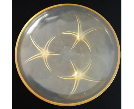 René Lalique (France, 1860-1945), a circular light amber coloured glass bowl in the 'Volubilis Pattern, France' circa 1930, d