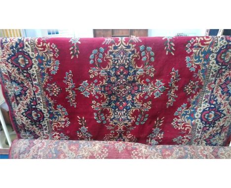 A large Persian design carpet square 
