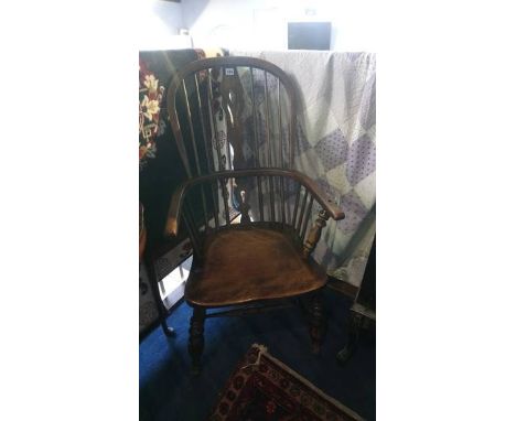 A stick back Windsor chair