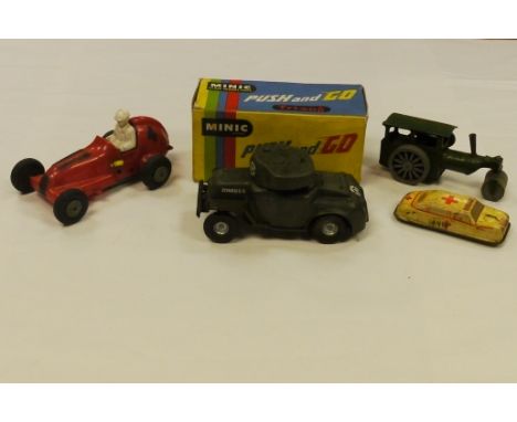 Tri-ang Vehicles, Push and Go Armoured Car and Series 2 Clockwork Sherman Tank, in original boxes, together with an ambulance
