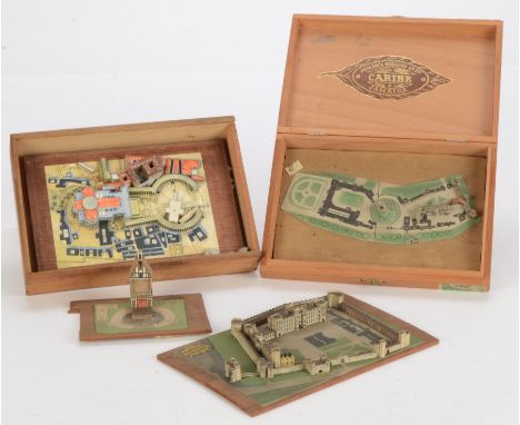 A collection of constructed Micromodels card kits,  including Tower of London, Windsor Castle, Vatican and Globe, all built t