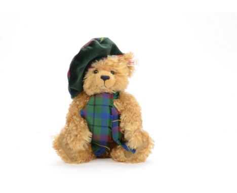 Modern Steiff Scottish Bear, reference 654732, golden mohair, plastic eyes, black stitched nose, dressed in tartan hat and sc