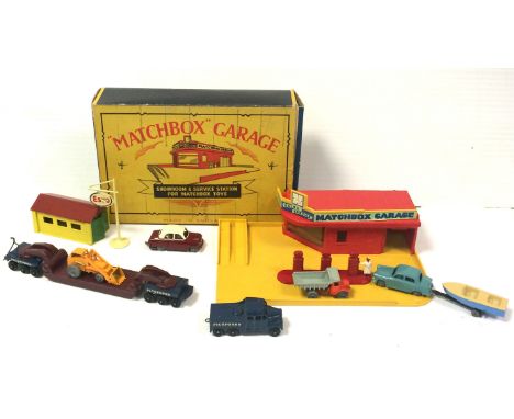 Matchbox Garage, plastic set, in original box, with diecast petrol pumps, sign and additional garage, together with six vehic