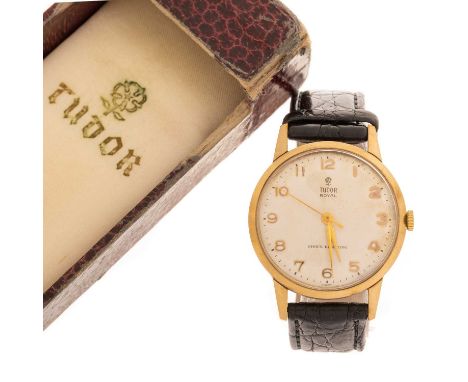 TUDOR, NINE CARAT GOLD MANUAL WIND WRIST WATCH the round dial with Arabic hour markers, 33mm case, on a generic black leather