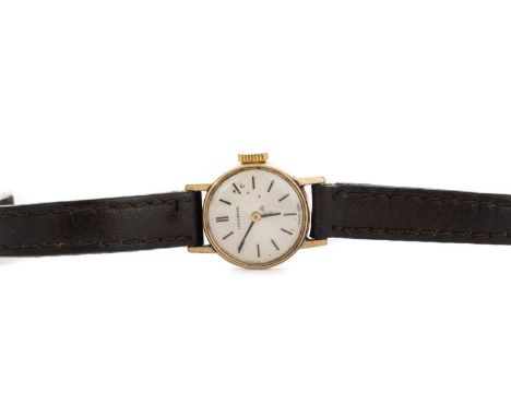 LONGINES NINE CARAT GOLD MANUAL WIND WRIST WATCH along with a nine carat gold cased example on a brown leather strap, lacking