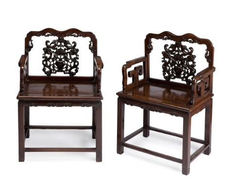 Pair of throne chairs. China, late Qing dynasty, 19th centuryCarved hongmu (sourwood) or Huanghuali (rosewood) wood.Very slig