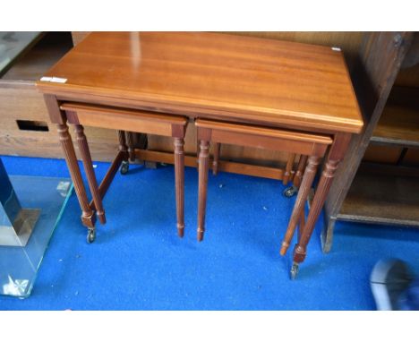 'A vintage nest of light mahogany tables, having Adams style legs, by Mcintosh