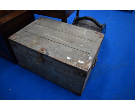 A rustic wooden tool chest