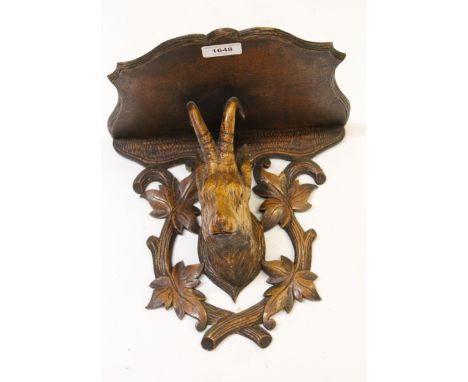 19th Century Black Forest wall shelf, mounted with a carved wooden head of a goat 