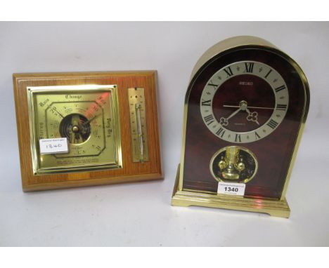 Seiko gilt metal quartz mantel clock, Staiger quartz mantel clock and an aneroid barometer / thermometer 