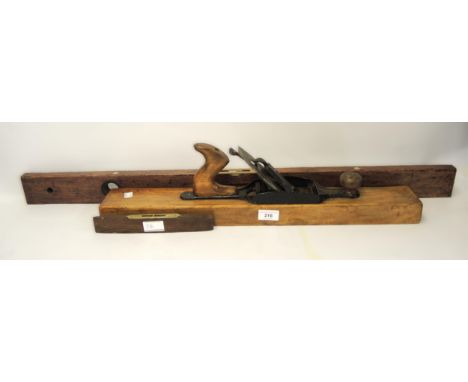 Sargent (Amercian) 24" iron and wooden jack plane, together with a Rabone spirit level and a smaller spirit level 