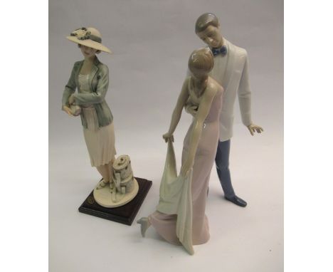 Lladro group of a man and woman in original box, together with a Florence Giuseppe Armani figure in original box and miscella