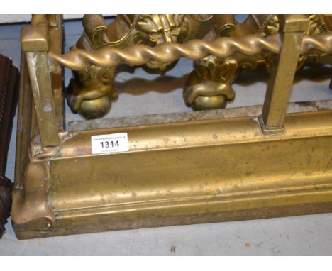 Edwardian brass fire kerb with integral tool holders 