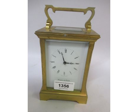 Good quality Mappin & Webb gilt brass carriage clock, the enamel dial with Roman numerals , with a two train English movement