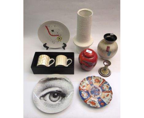 Poole pottery ginger jar and cover, two pottery vases, three plates, a candlestick and a pair of Claridge's boxed mugs 