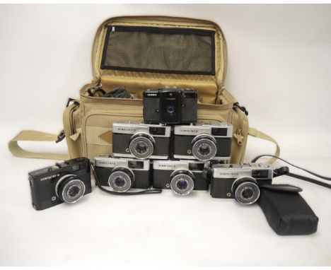 Camera bag containing six 35mm Olympus Trip 35's including one Limited Edition in black, together with a Lomo LC-A Soviet com
