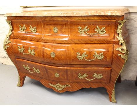 20th Century French Kingwood and ormolu bombe commode in Louis XV style, with rouge marble top above three drawers, 136 x 55 