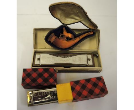 Cased 19th Century Meerschaum pipe and two boxed harmonicas 
