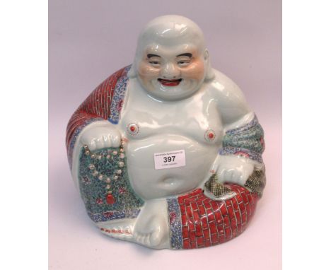 Chinese porcelain figure of seated Buddha, signed with seal mark to base, 26cm highHas been checked under a UV light and ther