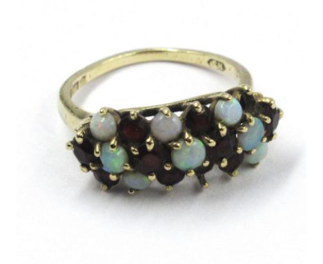 9ct Gold garnet and opal set dress ring, minus one opal, size K, 2.6g 