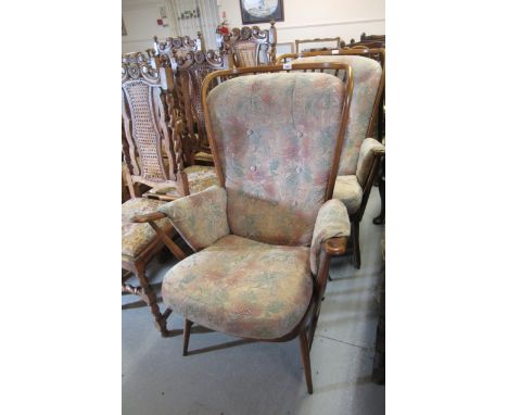 Near pair of mid 20th Century Ercol stickback armchairs 