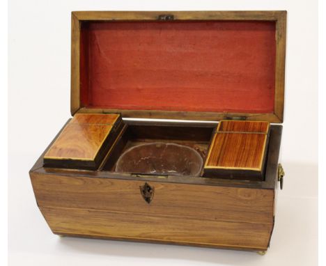 Regency rosewood sarcophagus shaped tea caddy, the hinged lid enclosing a three division interior with an associated later bl
