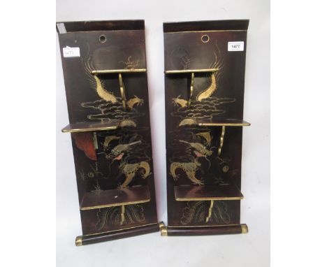 Pair of late 19th / early 20th Century Japanese lacquered three shelf folding wall brackets gilt decorated with dragons 