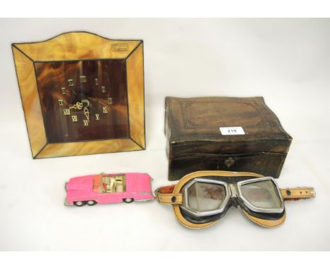 Pair of vintage motorcycle goggles, leather jewellery box, Corgi Fab 1 car (at fault), and a quartz mantel clock 