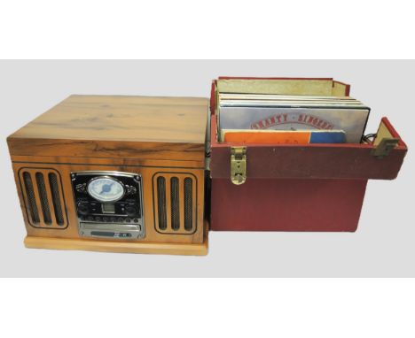Modern Neostar music centre in 1940's style, with integral record player, including a case of various LP's 