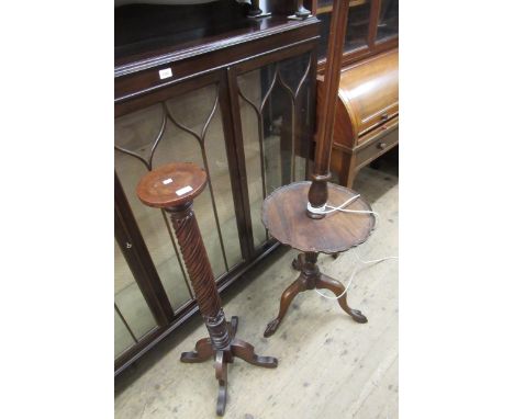 20th Century mahogany standard lamp / coffee table (at fault), together with a mahogany torchere 