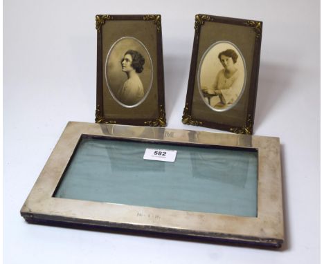 White metal photograph frame inscribed with an 'M' and the date 16-4-16 together with two 1920's photograph frames 