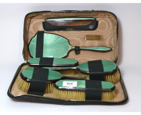 London silver and green translucent enamel decorated six piece dressing table set, in fitted case by Mappin & Webb 